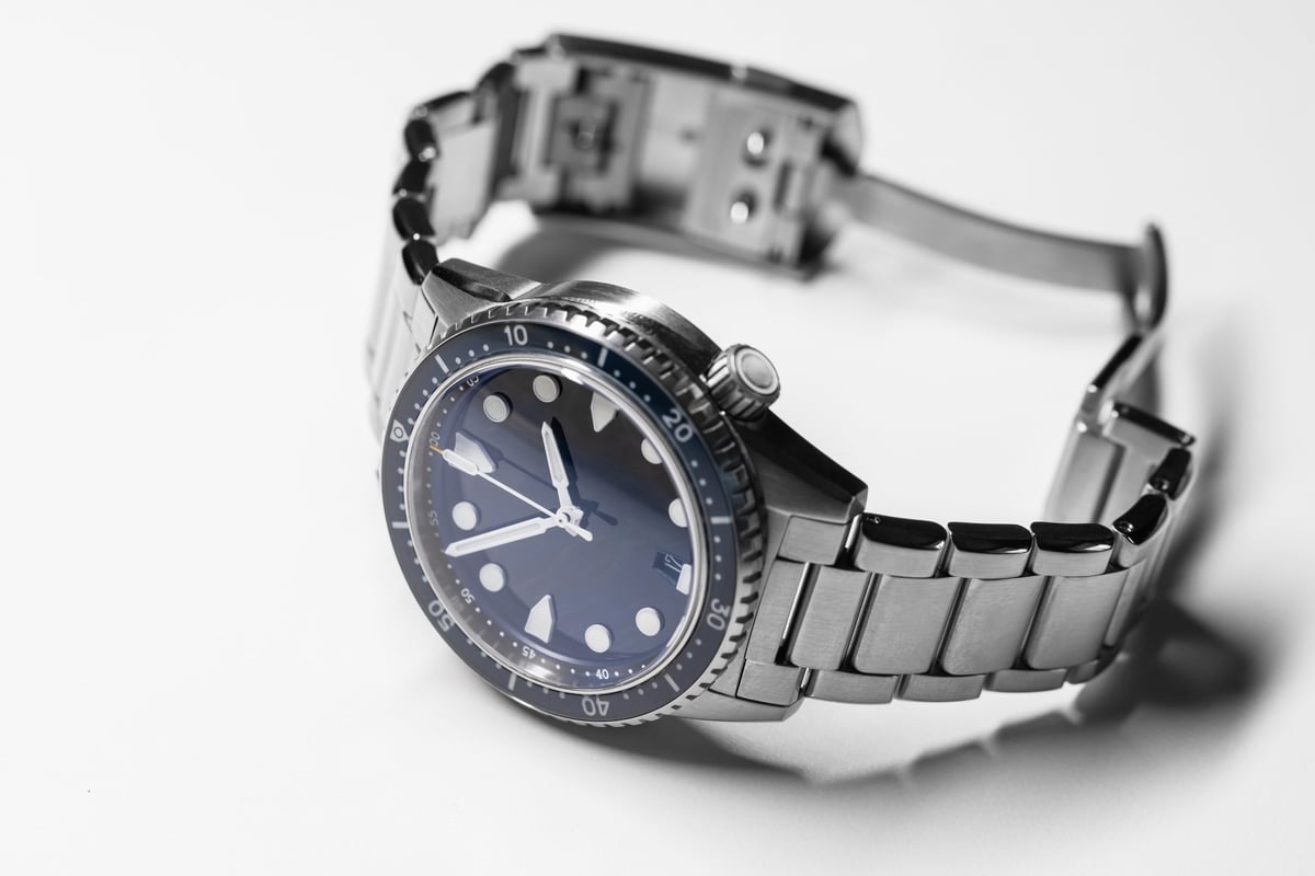 Elegant stainless steel dive watch with blue dial