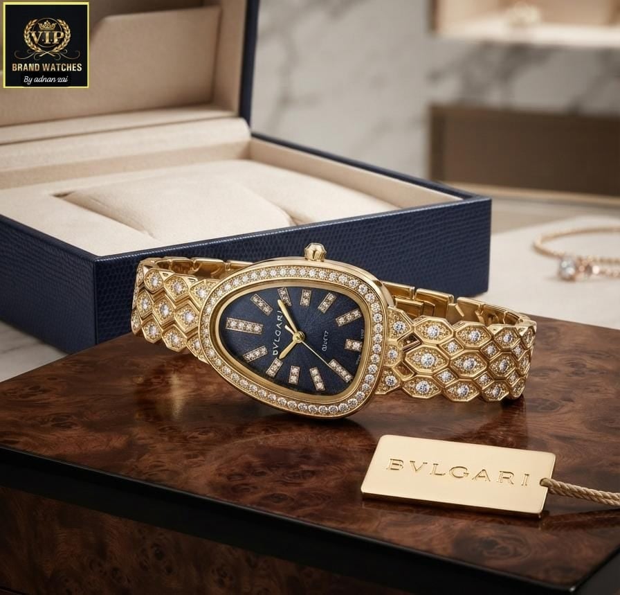Bvlgari Serpenti watch with diamond-encrusted bracelet and gold case displayed with branded packaging